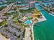 Aerial view showing community pool, tennis courts, and waterfront location at 5200 Brittany S Dr # 1204, St Petersburg, FL 33715