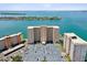 Aerial view of waterfront highrise building with parking and bay views at 5200 Brittany S Dr # 1204, St Petersburg, FL 33715