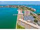 Aerial view of waterfront condo building with parking and boat docks at 5200 Brittany S Dr # 1204, St Petersburg, FL 33715