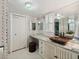 Updated bathroom with granite vanity, vessel sink, and mosaic tile at 5200 Brittany S Dr # 1204, St Petersburg, FL 33715