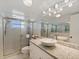 Updated bathroom with granite vanity, vessel sink, and walk-in shower at 5200 Brittany S Dr # 1204, St Petersburg, FL 33715
