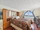 Comfortable bedroom with water views and built-in dresser at 5200 Brittany S Dr # 1204, St Petersburg, FL 33715