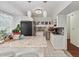 Modern kitchen with granite countertops and white cabinets at 5200 Brittany S Dr # 1204, St Petersburg, FL 33715