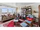 Living room with hardwood floors, bay windows, and sitting area at 5200 Brittany S Dr # 1204, St Petersburg, FL 33715