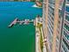 Waterfront condo building with private boat dock and lush landscaping at 5200 Brittany S Dr # 1204, St Petersburg, FL 33715