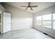 Bright bedroom with large windows and lake view at 10157 Bessemer Pond Ct, Riverview, FL 33578