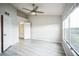 Main bedroom with ensuite bathroom and ample natural light at 10157 Bessemer Pond Ct, Riverview, FL 33578