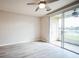 Spacious bonus room featuring sliding glass doors and a view at 10157 Bessemer Pond Ct, Riverview, FL 33578