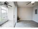 Bright bonus room with sliding glass doors leading to a screened patio at 10157 Bessemer Pond Ct, Riverview, FL 33578