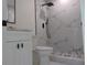 Contemporary bathroom, marble shower, white vanity at 10322 N Oakleaf Ave, Tampa, FL 33612