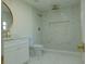 Modern bathroom with marble shower and white vanity at 10322 N Oakleaf Ave, Tampa, FL 33612