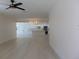 Bright and airy living room with light wood flooring at 10322 N Oakleaf Ave, Tampa, FL 33612