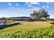 Resort-style clubhouse with expansive green space at 13015 Whisper Bay Pl, Tampa, FL 33618