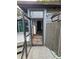 Back entrance with tiled flooring and glass door at 13225 2Nd E St, Madeira Beach, FL 33708