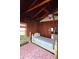 Small bedroom with two twin beds and wood walls at 13225 2Nd E St, Madeira Beach, FL 33708