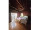 Cozy bedroom with hardwood floors and access to backyard at 13225 2Nd E St, Madeira Beach, FL 33708