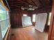 Small bedroom with hardwood floors and large window at 13225 2Nd E St, Madeira Beach, FL 33708