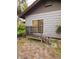 Small deck with metal railing and stairs at 13225 2Nd E St, Madeira Beach, FL 33708