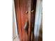 Rustic wooden door with unique handle and lock at 13225 2Nd E St, Madeira Beach, FL 33708