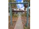 House exterior with teal door and walkway at 13225 2Nd E St, Madeira Beach, FL 33708
