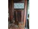 Unique wood front door, showcasing handcrafted details at 13225 2Nd E St, Madeira Beach, FL 33708