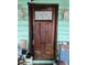 Charming wood front door with etched glass detail at 13225 2Nd E St, Madeira Beach, FL 33708
