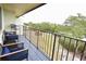 Relaxing balcony with outdoor furniture and water views at 1515 Pinellas Bayway S # 70, Tierra Verde, FL 33715