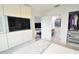 Main bedroom with built-in media and walk-in closet at 1515 Pinellas Bayway S # 70, Tierra Verde, FL 33715