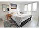 Bright bedroom with comfortable bed and large windows at 1515 Pinellas Bayway S # 70, Tierra Verde, FL 33715