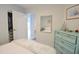 Bedroom with mirrored closet and view into another room at 1515 Pinellas Bayway S # 70, Tierra Verde, FL 33715
