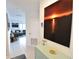 Entryway with contemporary decor and view to living area at 1515 Pinellas Bayway S # 70, Tierra Verde, FL 33715