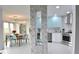 Modern kitchen with stainless steel appliances and light blue cabinets at 1515 Pinellas Bayway S # 70, Tierra Verde, FL 33715