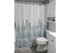 Bathroom with a shower/tub and teal decor at 1819 Shore S Dr # 203, South Pasadena, FL 33707