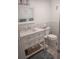 Clean bathroom with updated vanity and mosaic tile at 1819 Shore S Dr # 203, South Pasadena, FL 33707