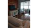Living room with light colored couch and wood floors at 1819 Shore S Dr # 203, South Pasadena, FL 33707