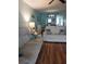 Living room with light gray reclining sofas at 1819 Shore S Dr # 203, South Pasadena, FL 33707