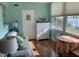 Relaxing sunroom with water views and comfortable seating at 1819 Shore S Dr # 203, South Pasadena, FL 33707