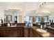 Double vanity bathroom with granite countertops and a large shower at 315 19Th Nw St, Ruskin, FL 33570