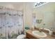 Guest bathroom with single vanity and shower/tub combo at 315 19Th Nw St, Ruskin, FL 33570