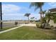 Landscaped front yard with lake view and curb appeal at 315 19Th Nw St, Ruskin, FL 33570