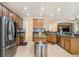 Modern kitchen with stainless steel appliances and an island at 315 19Th Nw St, Ruskin, FL 33570