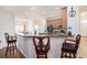 Kitchen island with seating for three and a granite countertop at 315 19Th Nw St, Ruskin, FL 33570