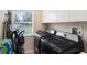 Laundry room with washer, dryer, and cabinets at 315 19Th Nw St, Ruskin, FL 33570