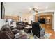 Relaxing living room with leather sofas and a large TV at 315 19Th Nw St, Ruskin, FL 33570