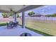 Covered patio with seating area and view of backyard at 3548 Thistle Bank Ct, Plant City, FL 33565