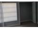 Bedroom with window, closet, and neutral walls at 4745 Puritan Cir # 4745, Tampa, FL 33617