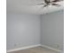 Spacious bedroom with ceiling fan and neutral walls at 4745 Puritan Cir # 4745, Tampa, FL 33617