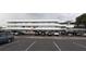 Exterior view of condo building with parking at 4895 Bay Ne St # 211, St Petersburg, FL 33703