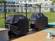Community grilling area with two grills at 4895 Bay Ne St # 211, St Petersburg, FL 33703