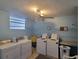 Shared laundry room with coin-operated machines at 4895 Bay Ne St # 211, St Petersburg, FL 33703